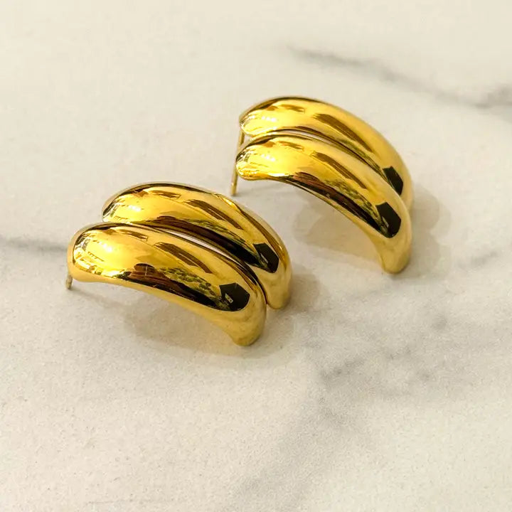 Pendientes de botón en acero inoxidable bañados en oro