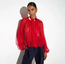 Blusa de crespón con cuello joya