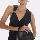 Bandolera negra compacta