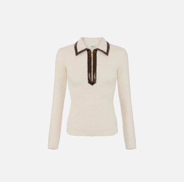 Polo de punto bouclé con detalles de vinilo