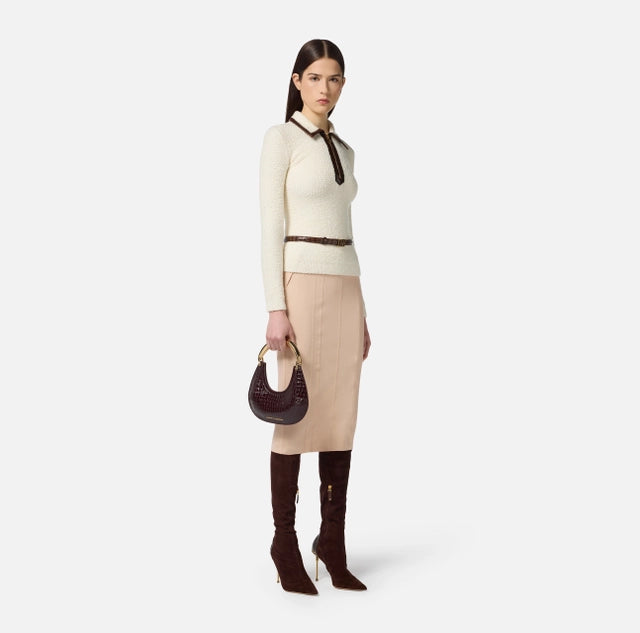 Polo de punto bouclé con detalles de vinilo