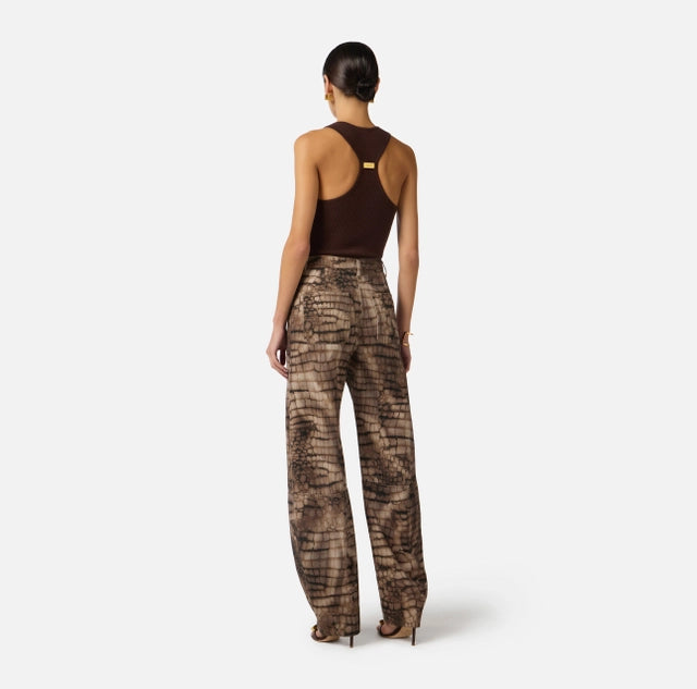 Pantalón denim de drill con estampado de cocodrilo