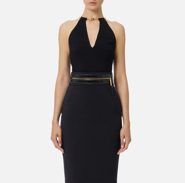 Top de punto con joya tipo snake