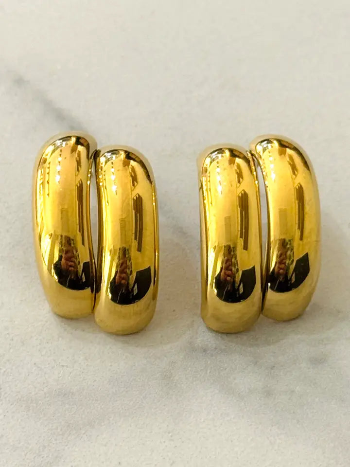 Pendientes de botón en acero inoxidable bañados en oro