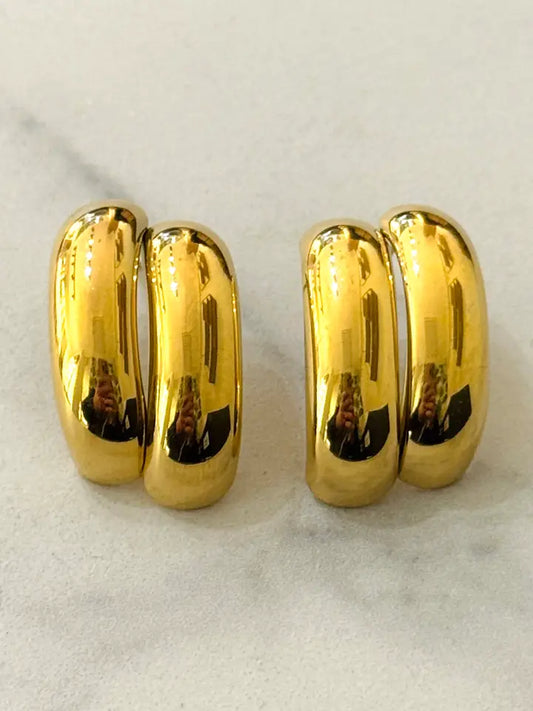 Pendientes de botón en acero inoxidable bañados en oro